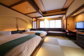 Отель Hotel Tamanoyu  Мацумото